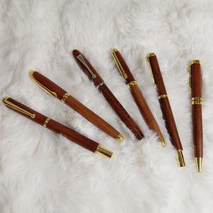 wooden pen with brass parts