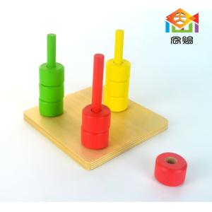 Colored Discs on 3 Colored Dowels Colored Discs on 3 Colored Dowels