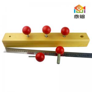 bolts and nuts with red ball