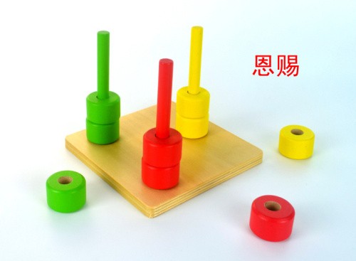 montessori material baby infant rings on pegs